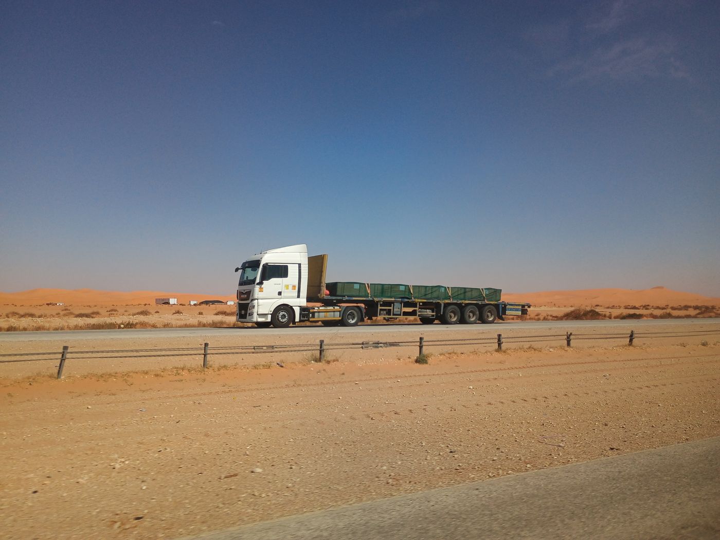 Flatbed truck on a GCC highway